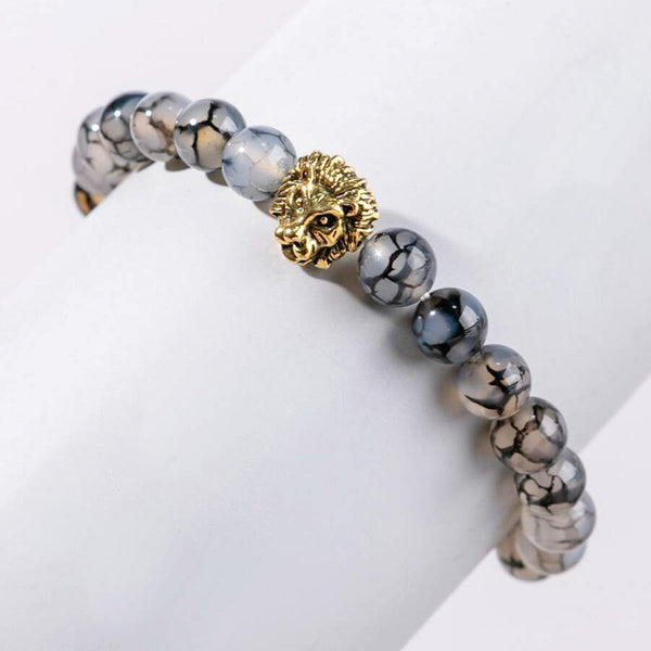 Pulseira de Pedra Natural com Cabeça de Leão, símbolo de força e liderança.