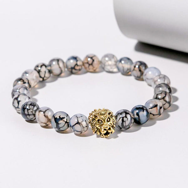 Pulseira de Pedra Natural com Cabeça de Leão, símbolo de força e liderança.