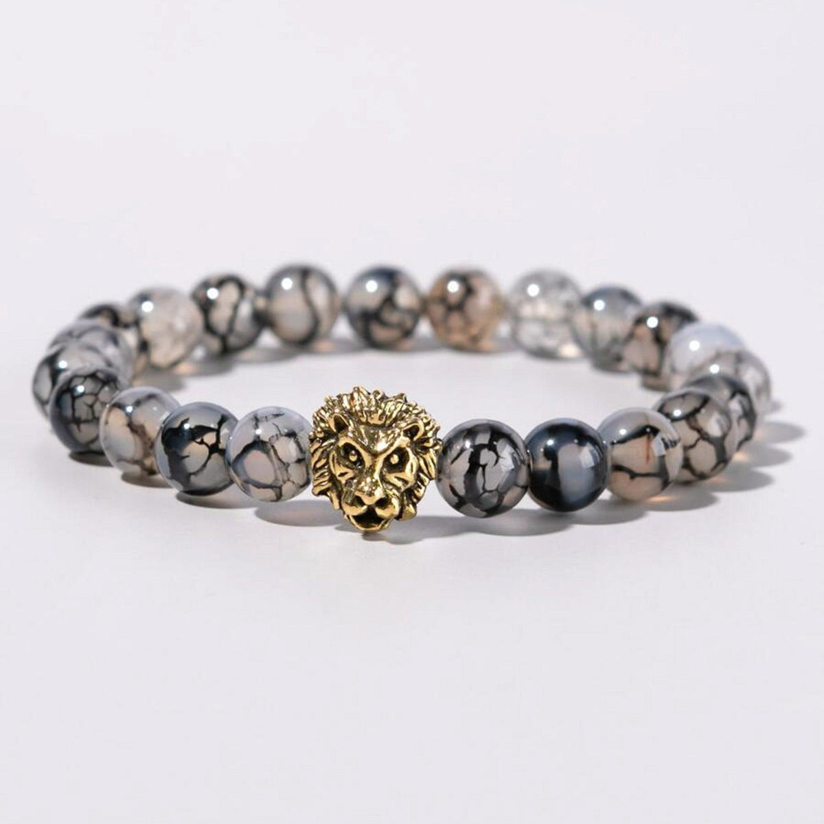 Pulseira de Pedra Natural com Cabeça de Leão, símbolo de força e liderança.