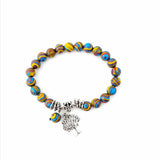 Pulseira Pedras Naturais Calsilica Arco-íris com Árvore da Vida, design vibrante simbolizando equilíbrio e crescimento espiritual.